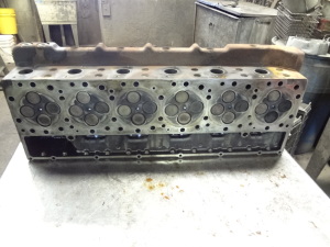 We pressure check C15 3406E Cat Acert heads